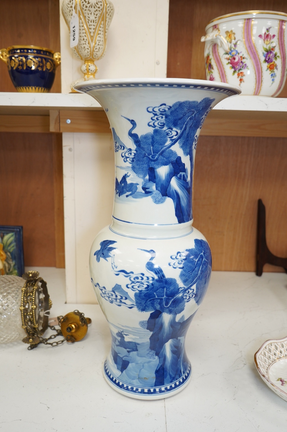 A Chinese blue and white yen yen vase, Kangxi mark but later, 46cm. Condition - crazing to rim, otherwise good